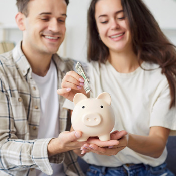 Couple with Piggy Bank
